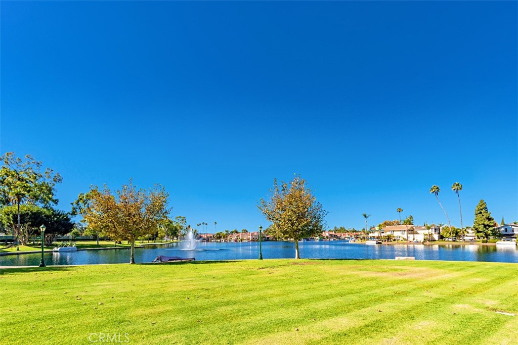 21526 Vía Serpiente Lake Forest, CA 92630 - Photo 48 of 51 a view of a swimming pool with an ocean view