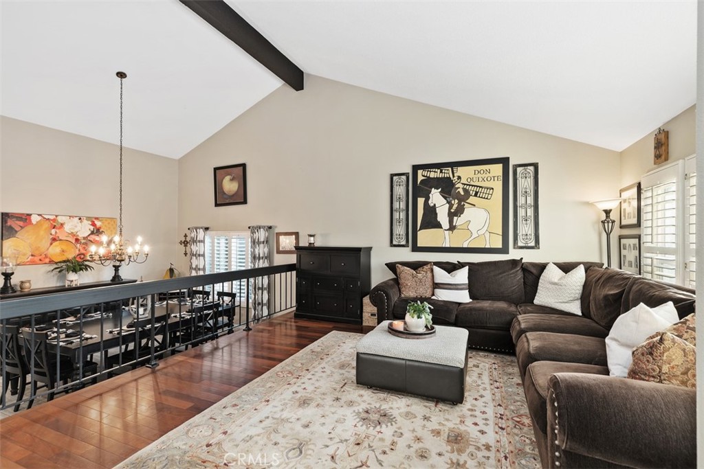 21526 Vía Serpiente Lake Forest, CA 92630 - Photo 50 of 51 a living room with furniture kitchen view and a large window