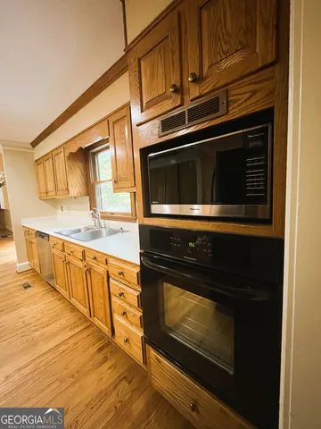 a bathroom with a sink and a shower