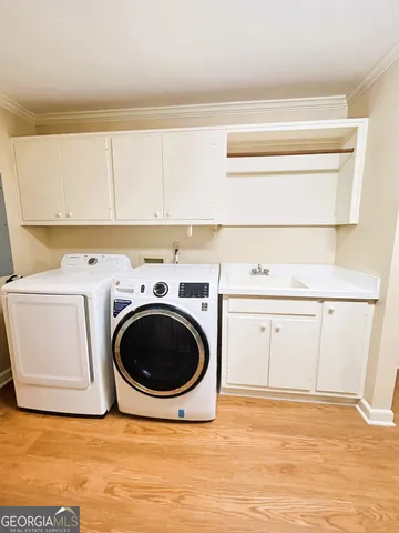 a bathroom with a sink and shower