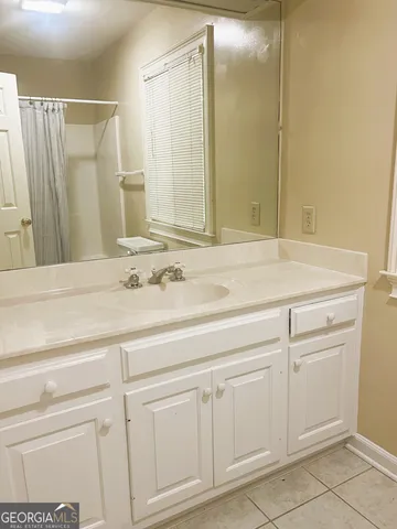 a view of a door with a bench