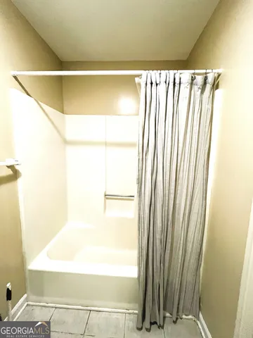 a view of a room with windows