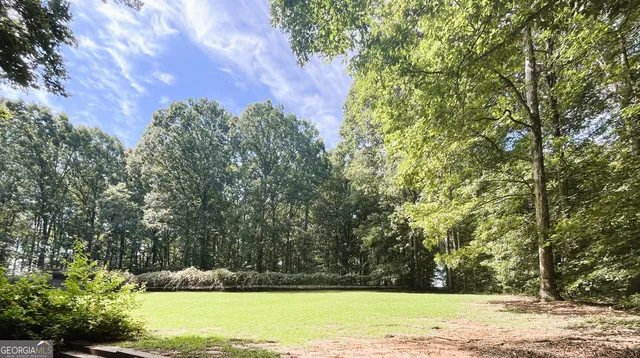 a view of a swimming pool and outdoor space