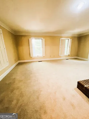 an empty room with a window