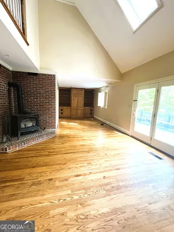a view of an empty room and window