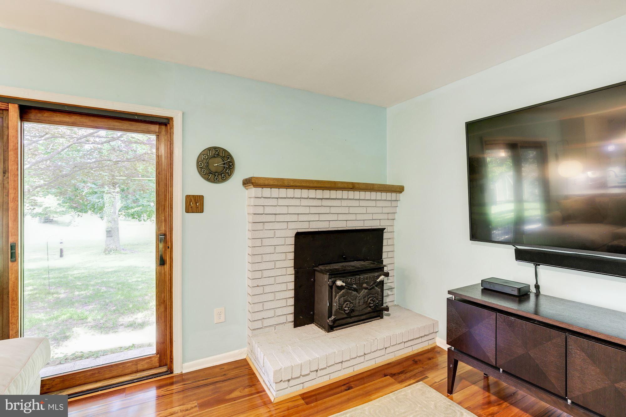3285 Sharp Road Glenwood, MD 21738 - Photo 20 of 41 Fireplace | Access to Patio