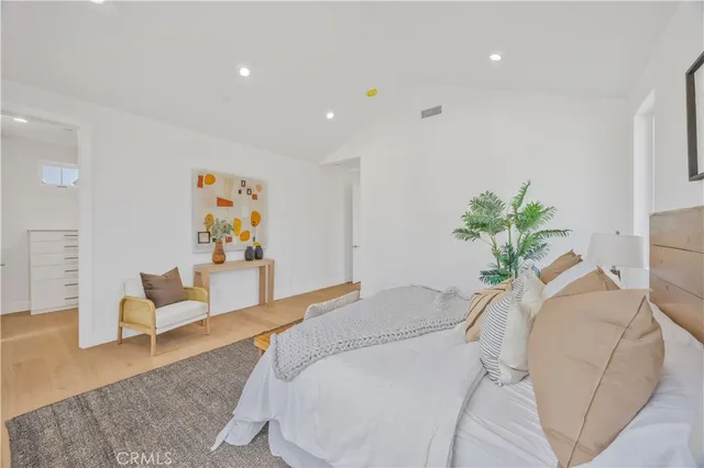 a bedroom with furniture and a couch