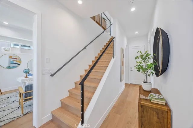 a view of entryway with wooden floor