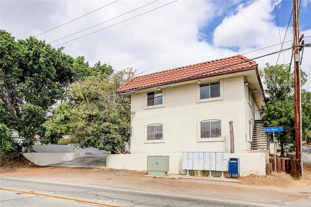 a kitchen with a stove and a microwave