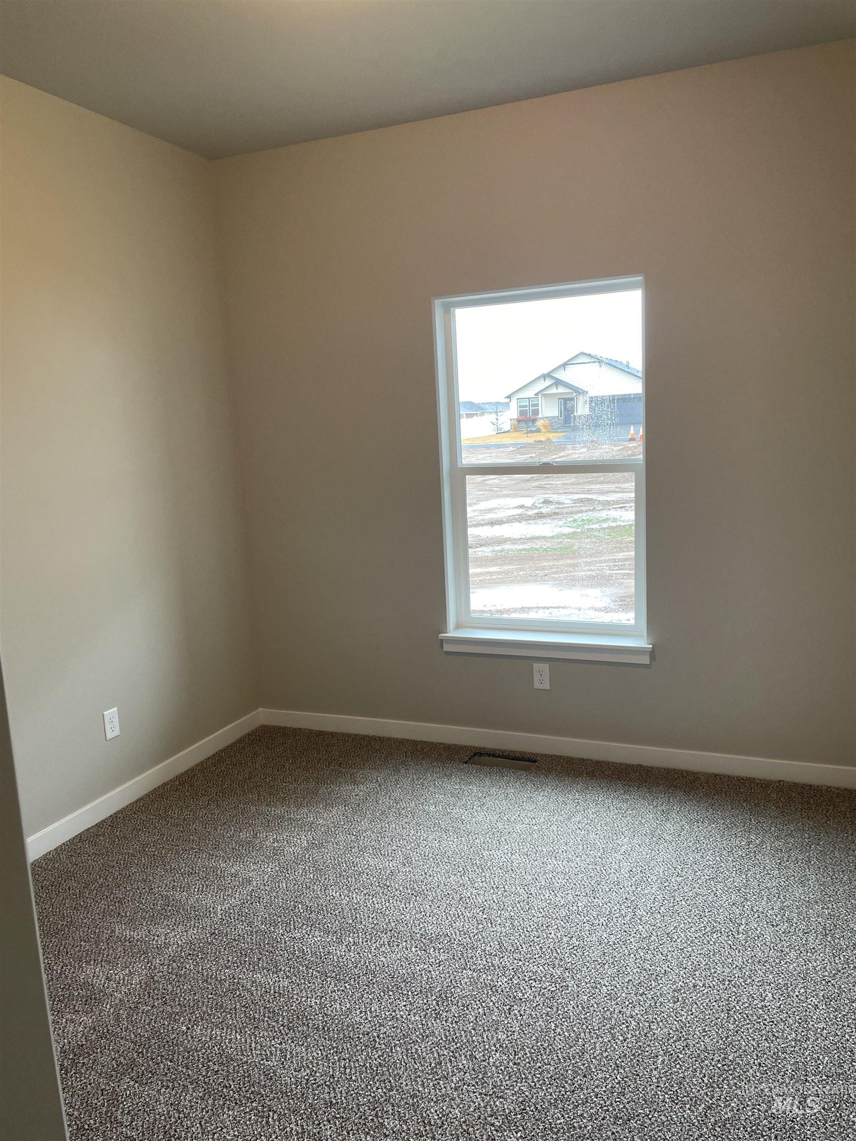 1123 Frank Henry Road Twin Falls, ID 83301 - Photo 14 of 20 Unfurnished room featuring carpet flooring and baseboards