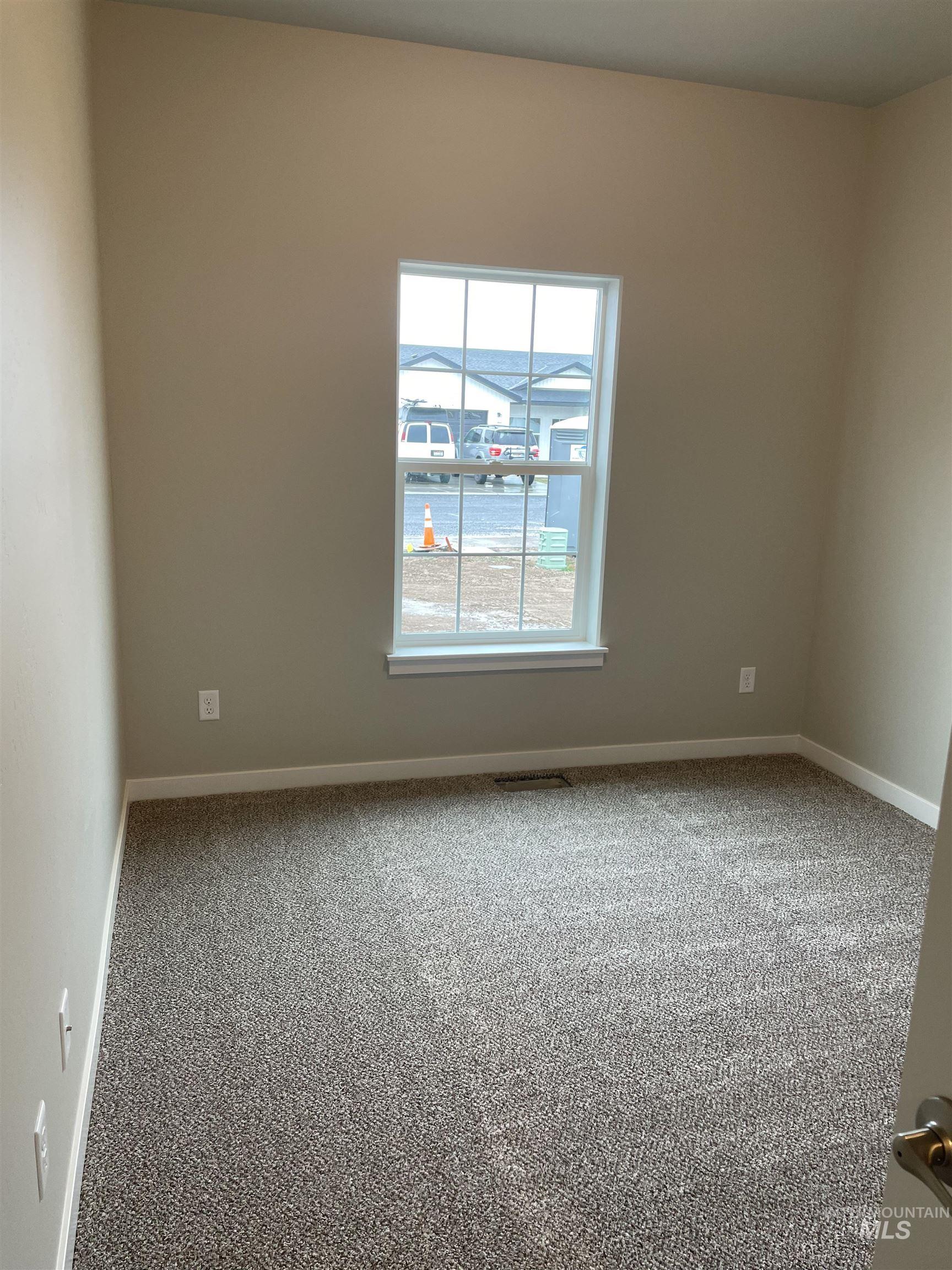1123 Frank Henry Road Twin Falls, ID 83301 - Photo 16 of 20 Carpeted empty room with baseboards