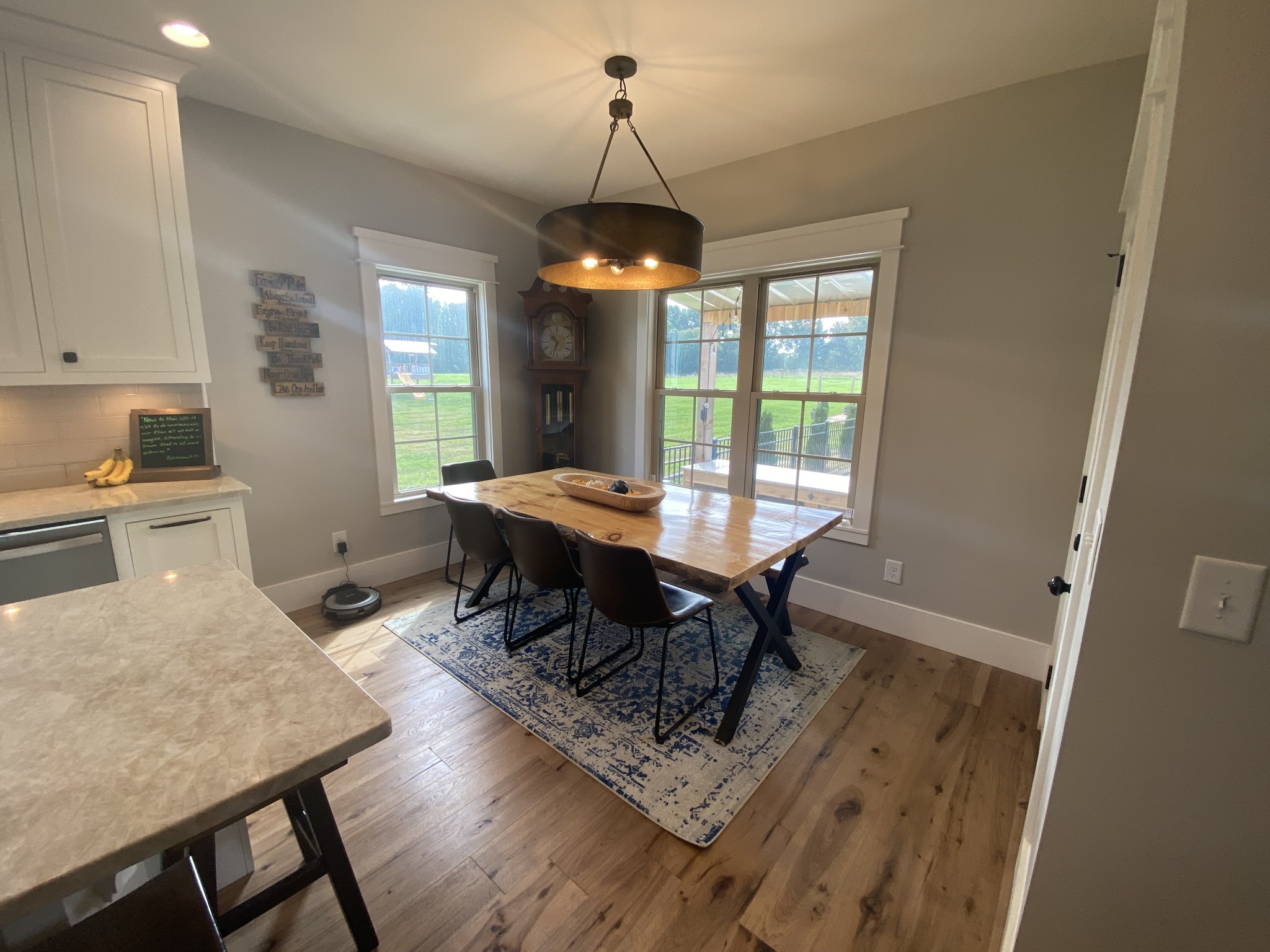 535 Tom Link Road Cottontown, TN 37048 - Photo 12 of 37 a view of a dining room with furniture window and wooden floor