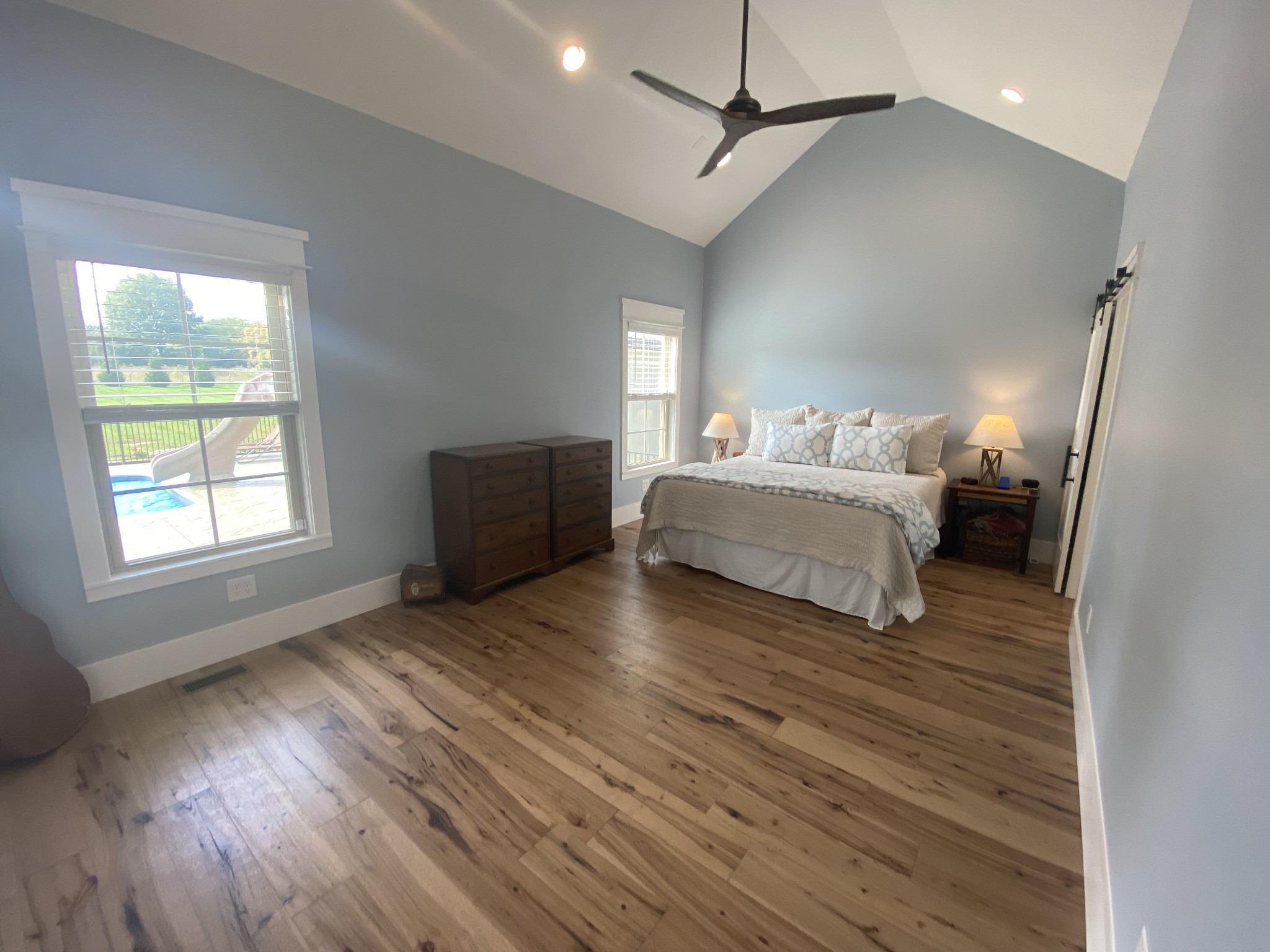 535 Tom Link Road Cottontown, TN 37048 - Photo 14 of 37 a bedroom with a bed and wooden floor