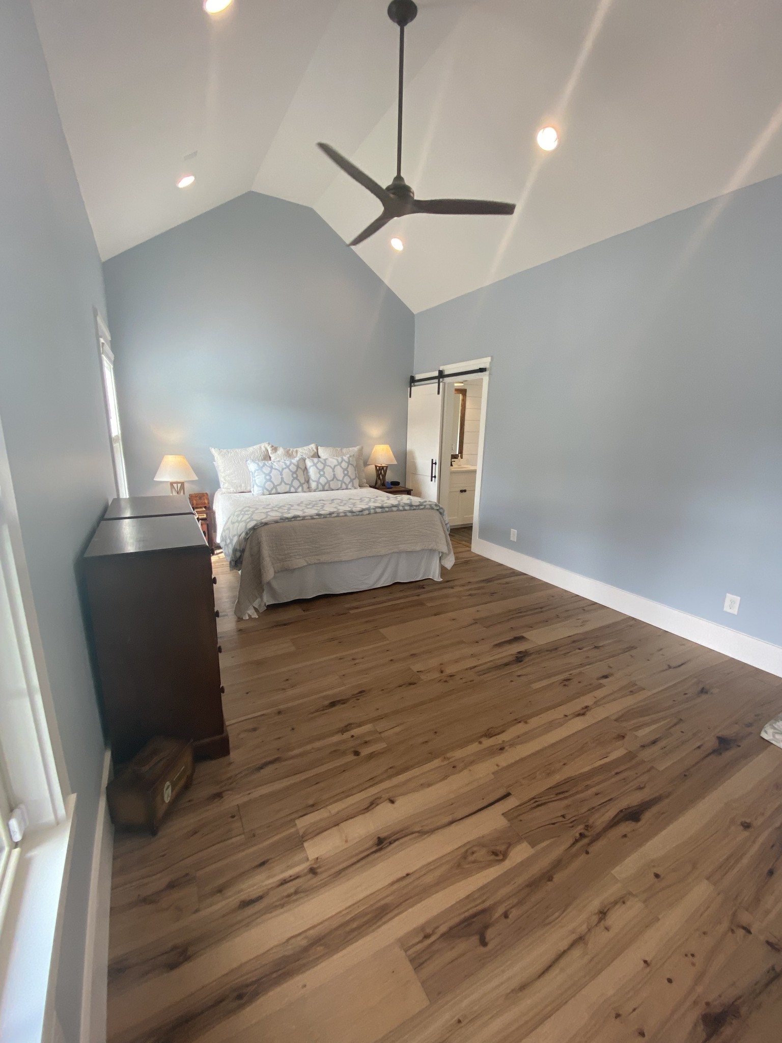 535 Tom Link Road Cottontown, TN 37048 - Photo 15 of 37 a view of a room with wooden floor staircase and a kitchen