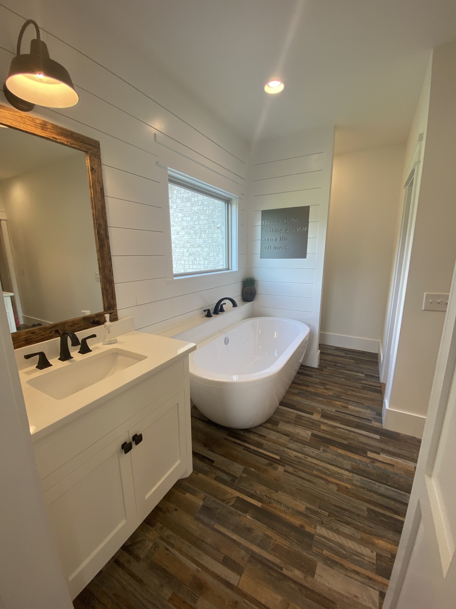 535 Tom Link Road Cottontown, TN 37048 - Photo 16 of 37 a bathroom with a sink and a mirror