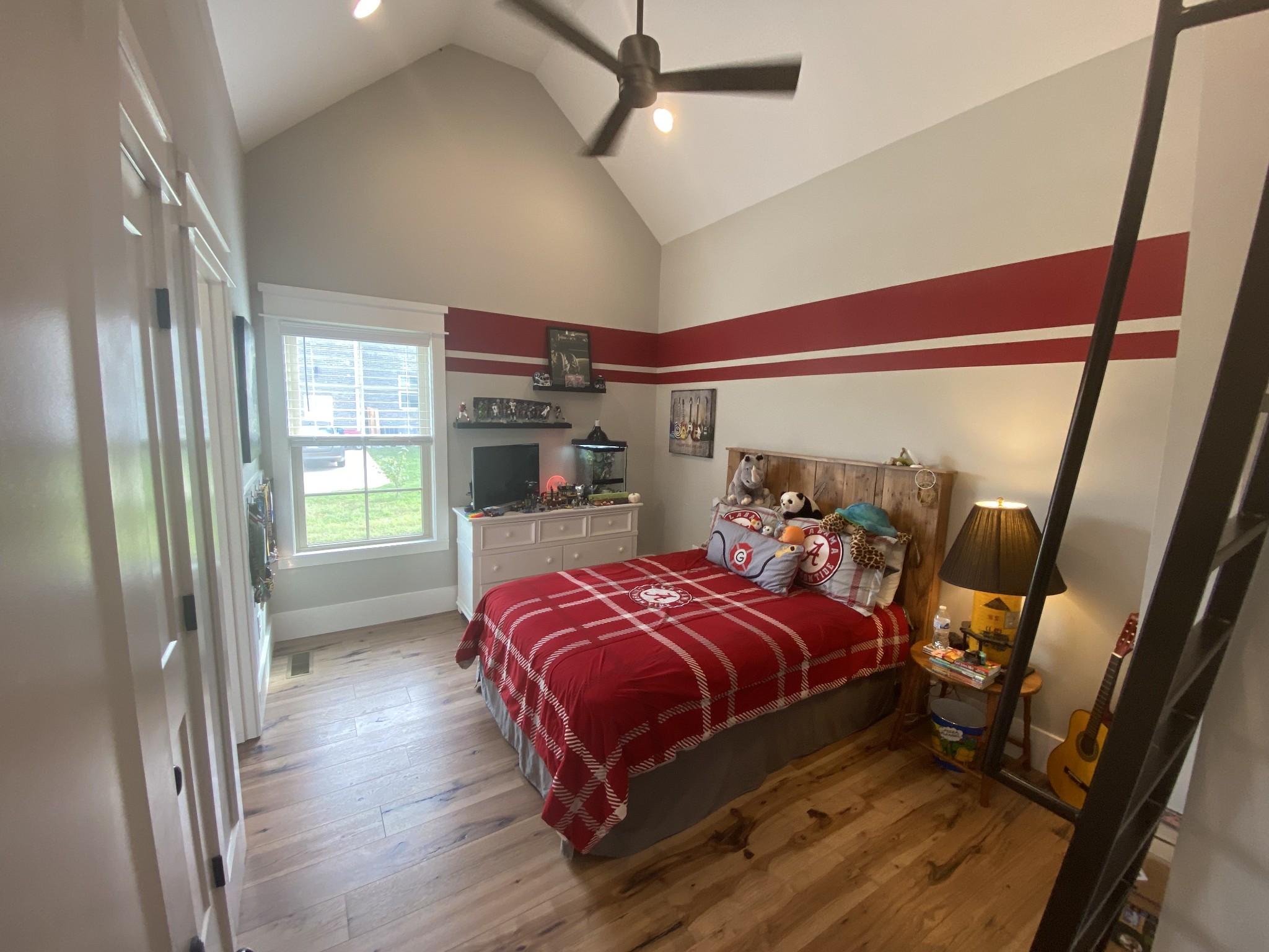 535 Tom Link Road Cottontown, TN 37048 - Photo 24 of 37 a bedroom with a bed and a mirror