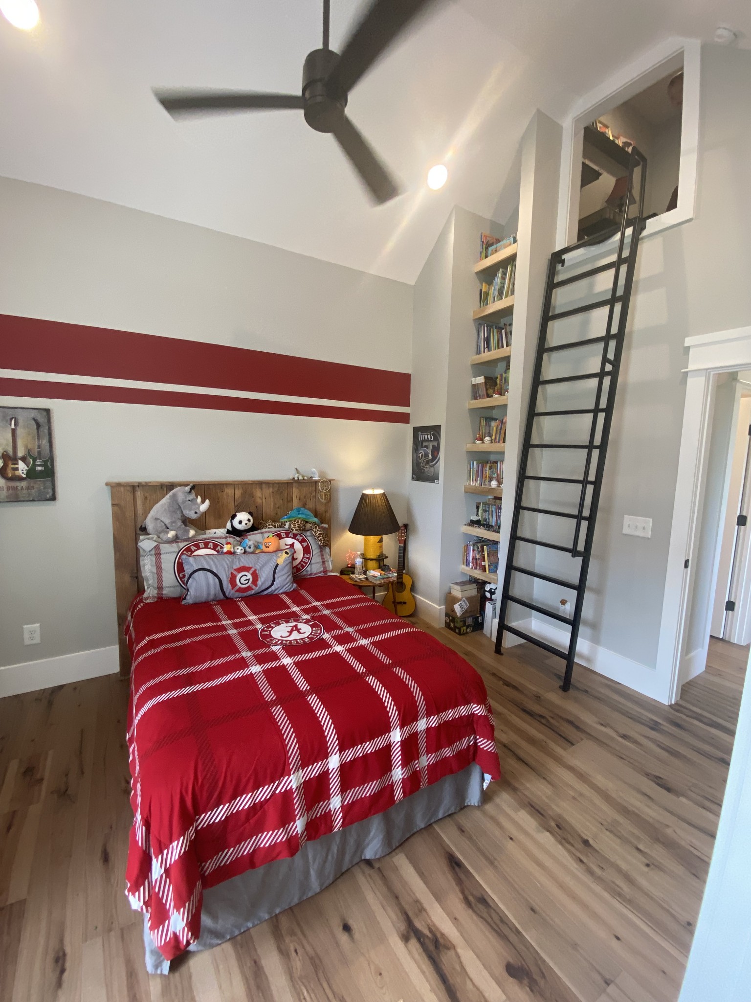 535 Tom Link Road Cottontown, TN 37048 - Photo 26 of 37 a bedroom with a bed and wooden floor