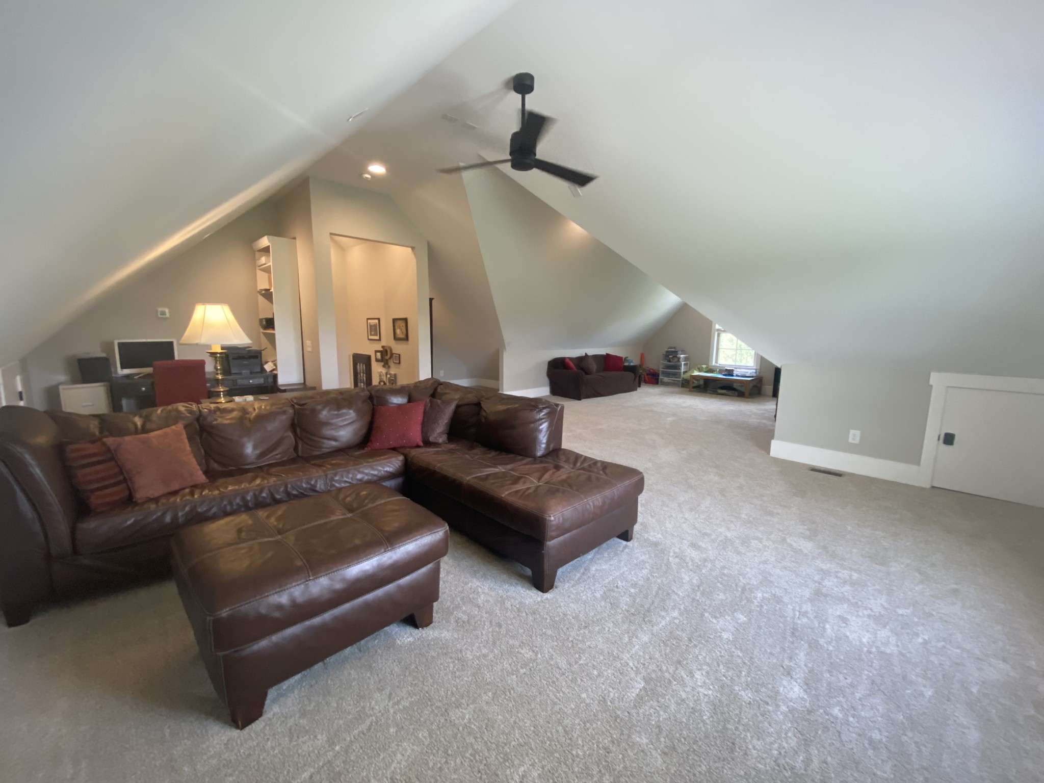 535 Tom Link Road Cottontown, TN 37048 - Photo 30 of 37 a living room with furniture and a ceiling fan