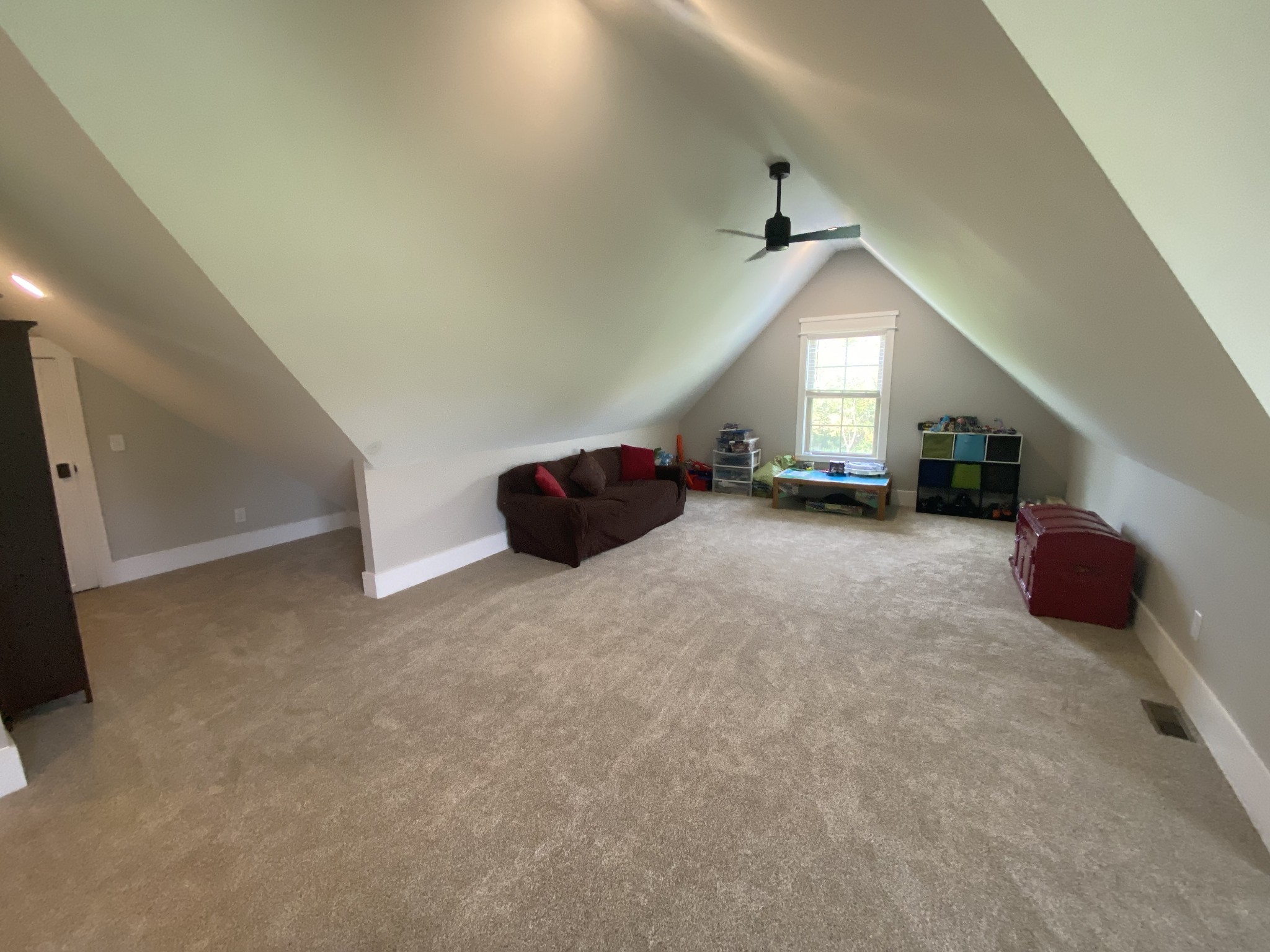 535 Tom Link Road Cottontown, TN 37048 - Photo 31 of 37 a view of a livingroom with furniture and a ceiling fan