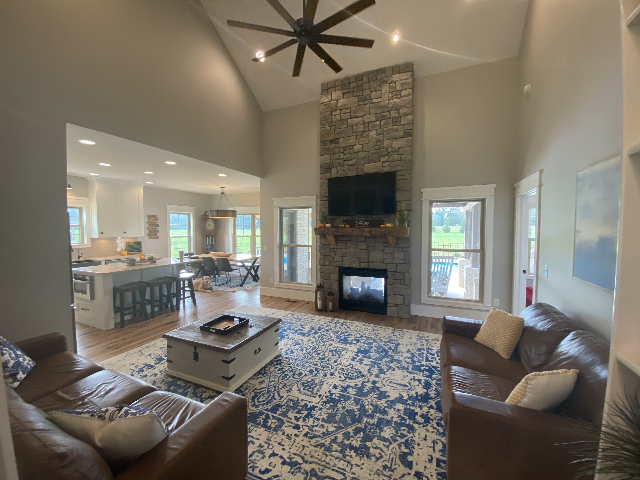 535 Tom Link Road Cottontown, TN 37048 - Photo 8 of 37 a living room with furniture a fireplace and a flat screen tv