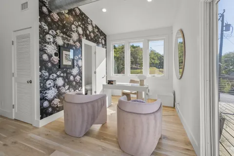 a bathroom with a sink and a window