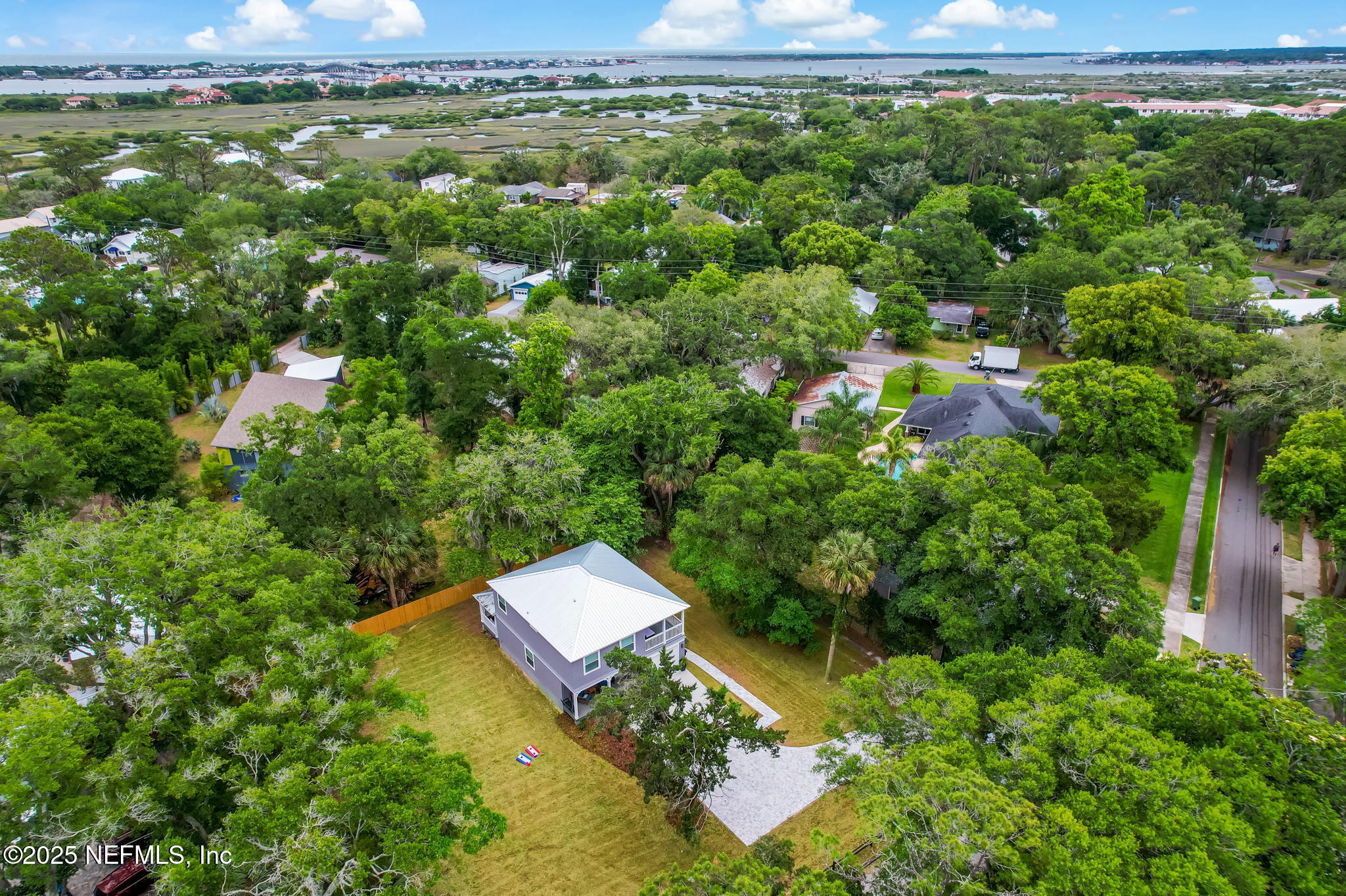 44 Hildreth Drive St. Augustine, FL 32084 - Photo 61 of 63 an aerial view of a house with a yard basket ball court and outdoor seating