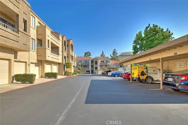 a view of a street with cars