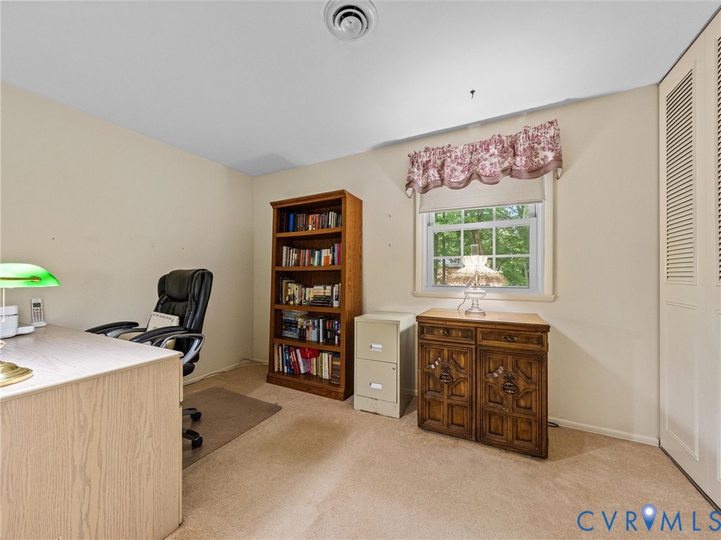112 Chasnell Road North Chesterfield, VA 23236 - Photo 33 of 49 Carpeted room with a built-in bookshelf, a louvere