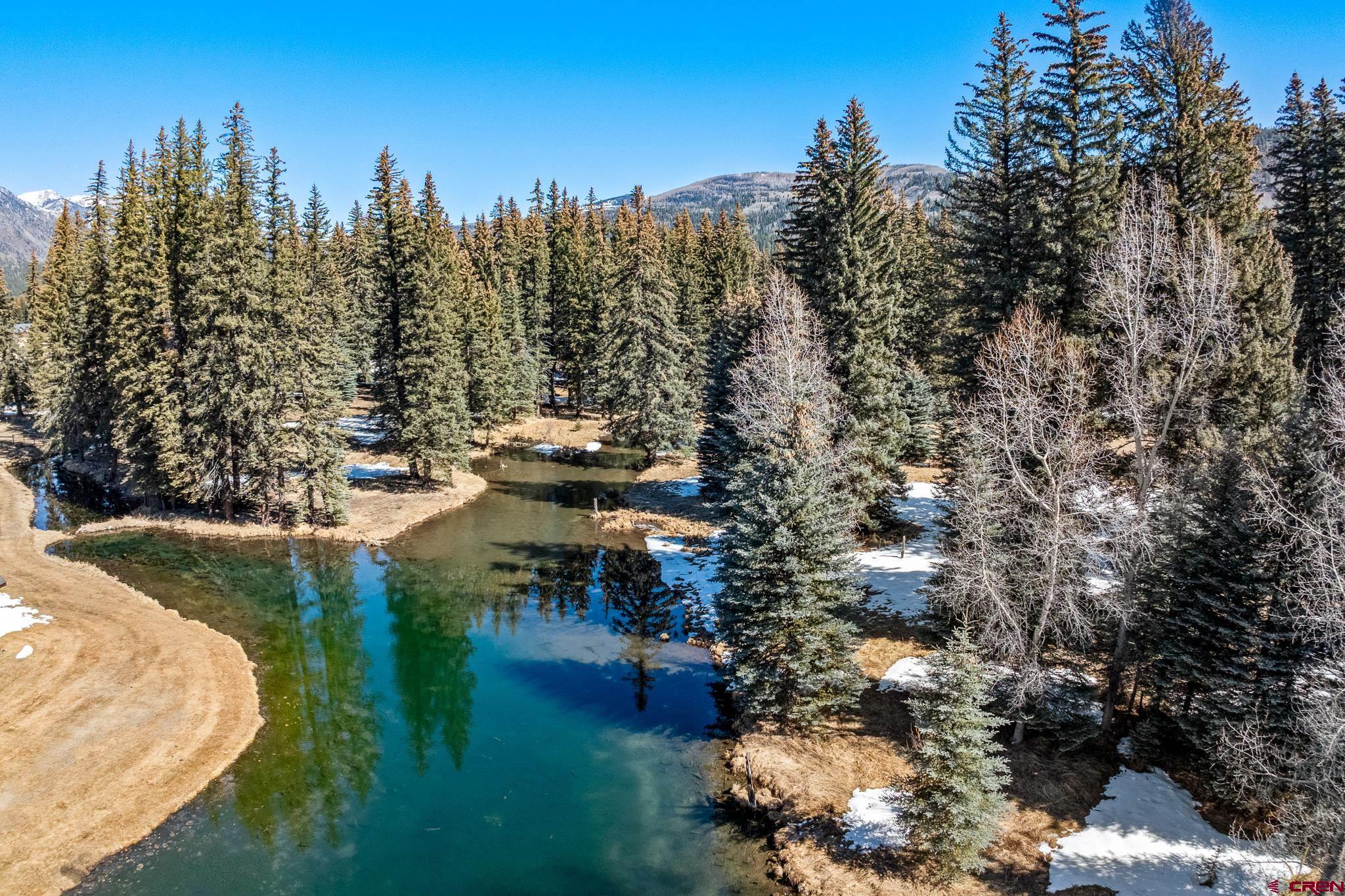 201 Golden Forest Road Bayfield, CO 81122 - Photo 9 of 17 a view of a lake with houses