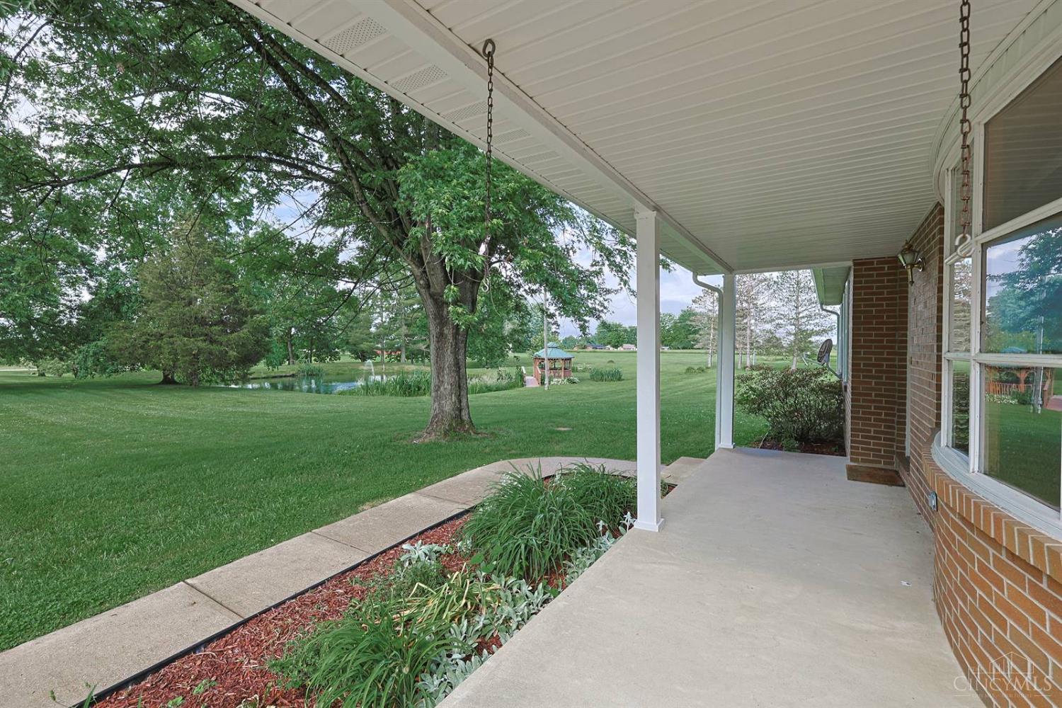 4617 Graybill Road Georgetown, OH 45121 - Photo 4 of 58 Spacious Front Porch Overlooking The Pond