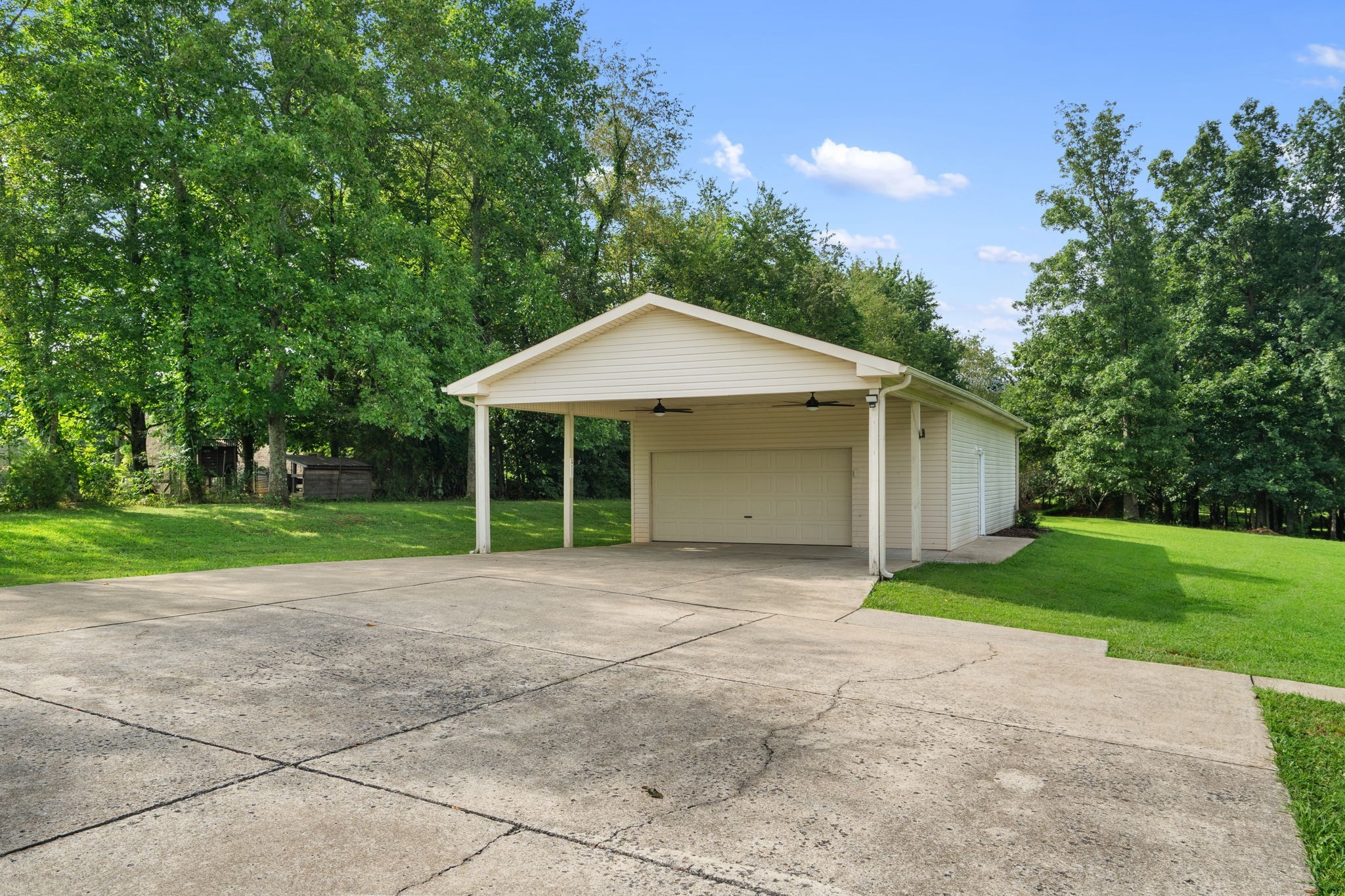 407 South Ray Road Portland, TN 37148 - Photo 39 of 47 a front view of a house with yard and green space