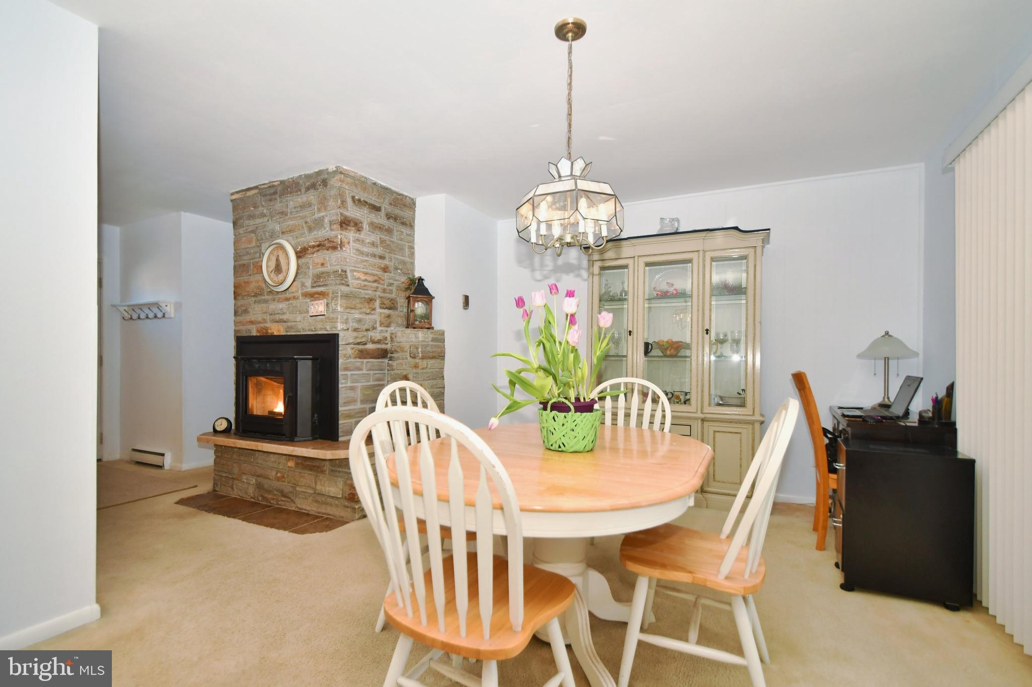 706 Falconer Road Joppa, MD 21085 - Photo 12 of 40 Beautiful stone fireplace houses pellet stove.