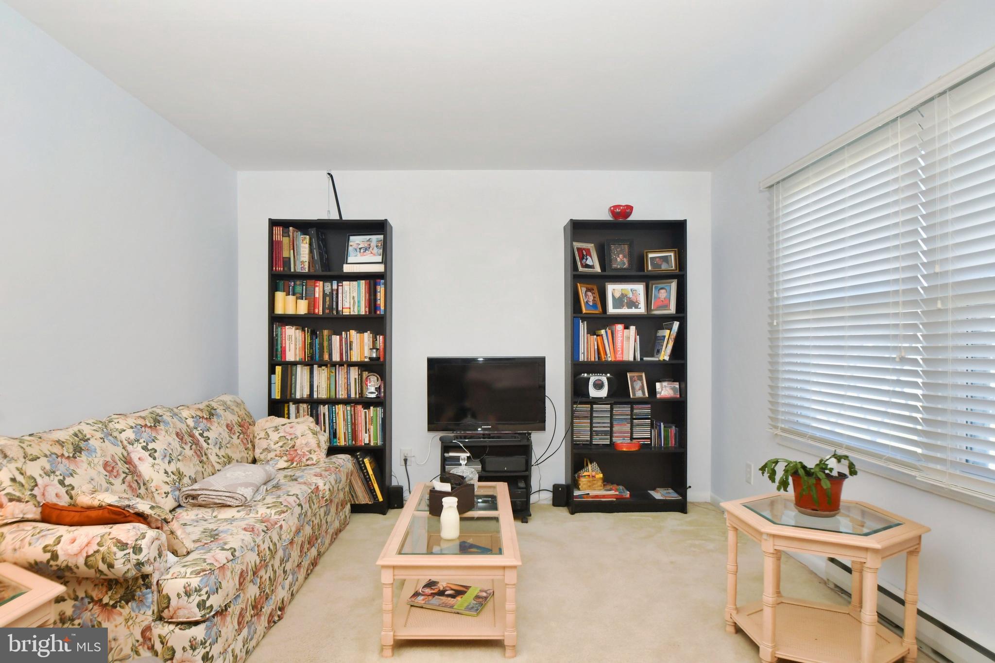 706 Falconer Road Joppa, MD 21085 - Photo 17 of 40 Bright Living Room has a double picture window.