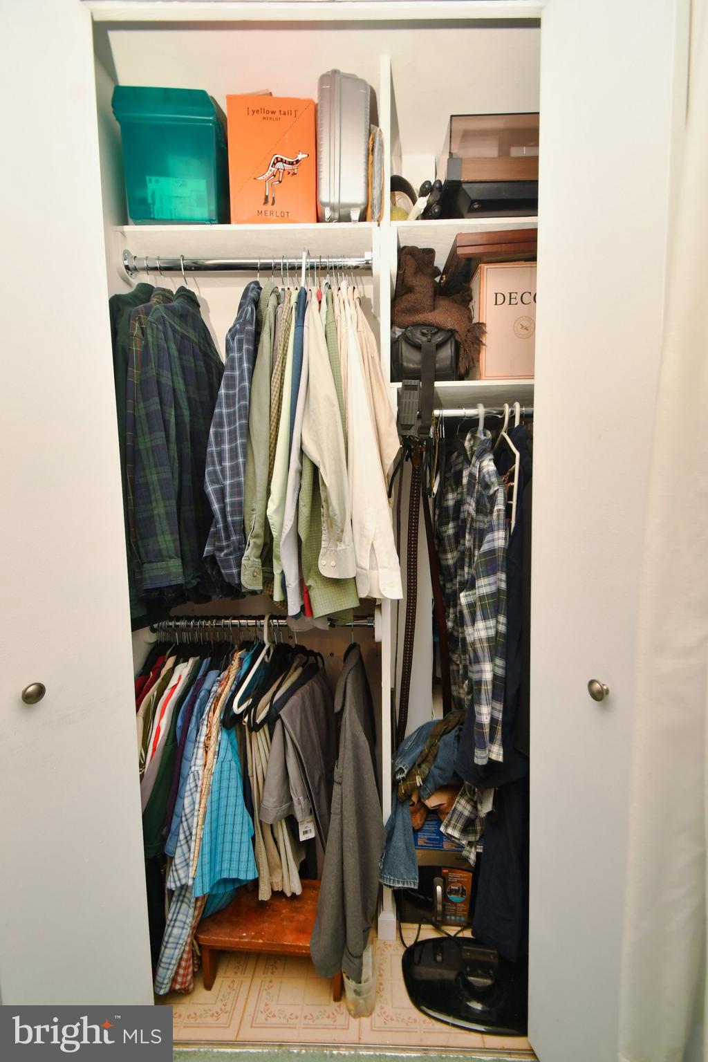 706 Falconer Road Joppa, MD 21085 - Photo 36 of 40 Master Bedroom closet has 2 tier hanging rods.