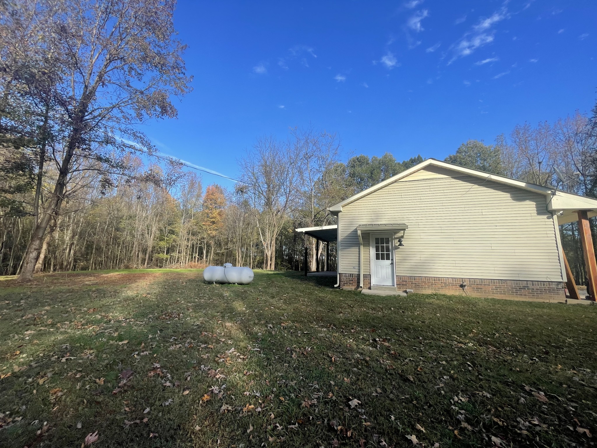 2758 Kinneys Road Cedar Hill, TN 37032 - Photo 6 of 45 a view of a house with backyard