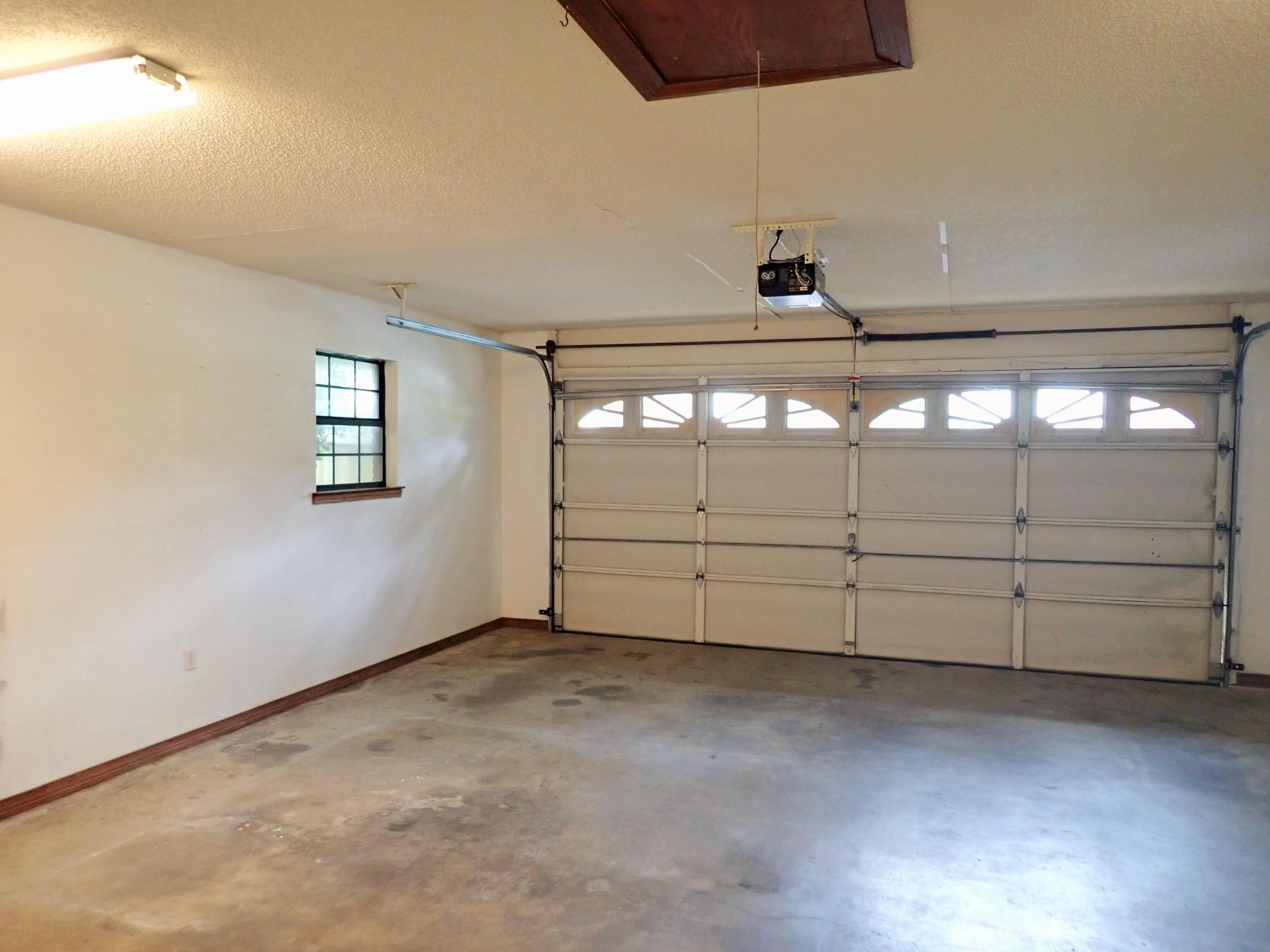 303 Sheldon Court Crestview, FL 32539 - Photo 28 of 45 a view of a garage