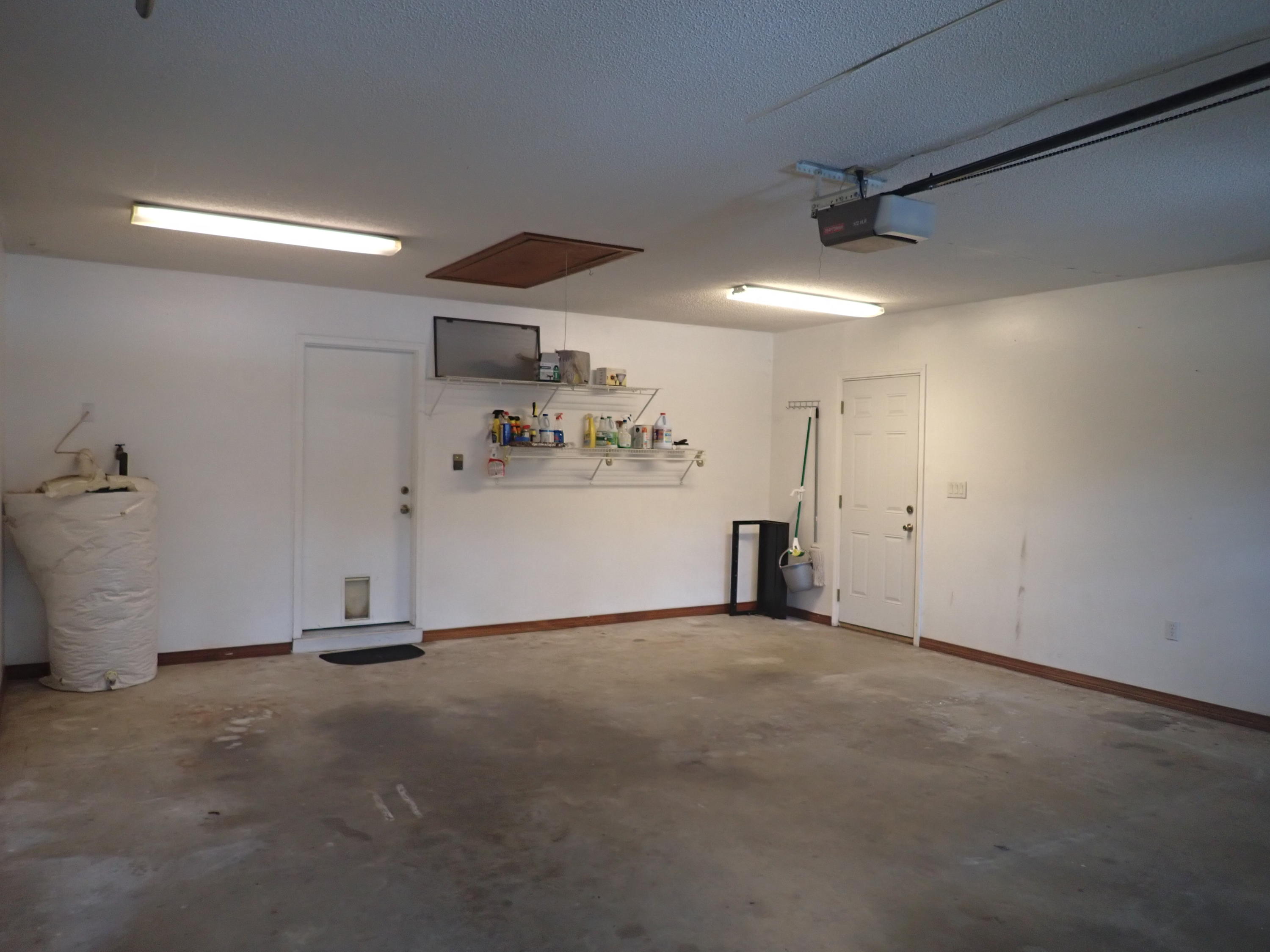 303 Sheldon Court Crestview, FL 32539 - Photo 30 of 45 a view of a room with gym equipment
