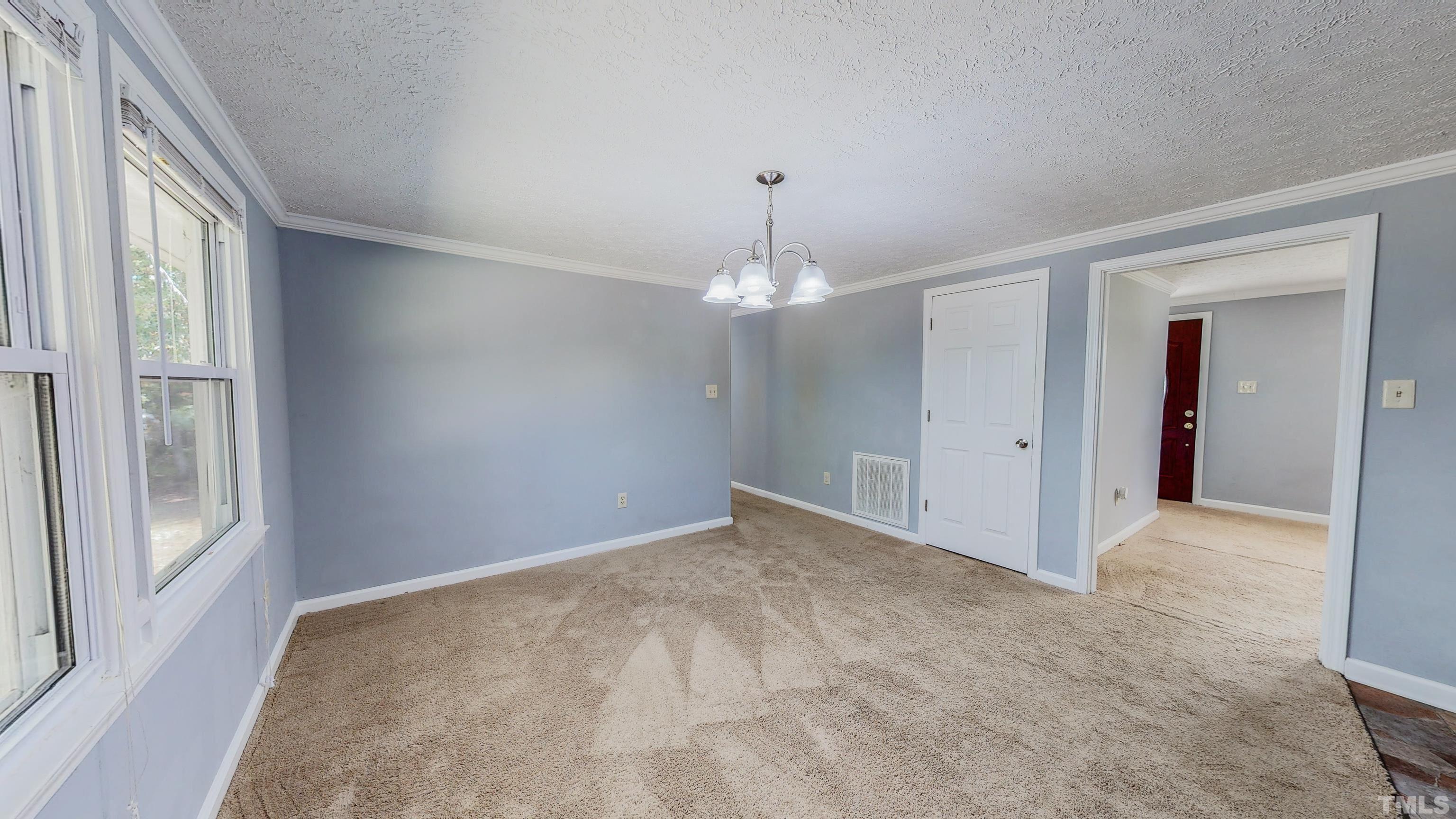 180 Dancy Day Road Roxboro, NC 27574 - Photo 15 of 30 a view of an empty room with a window