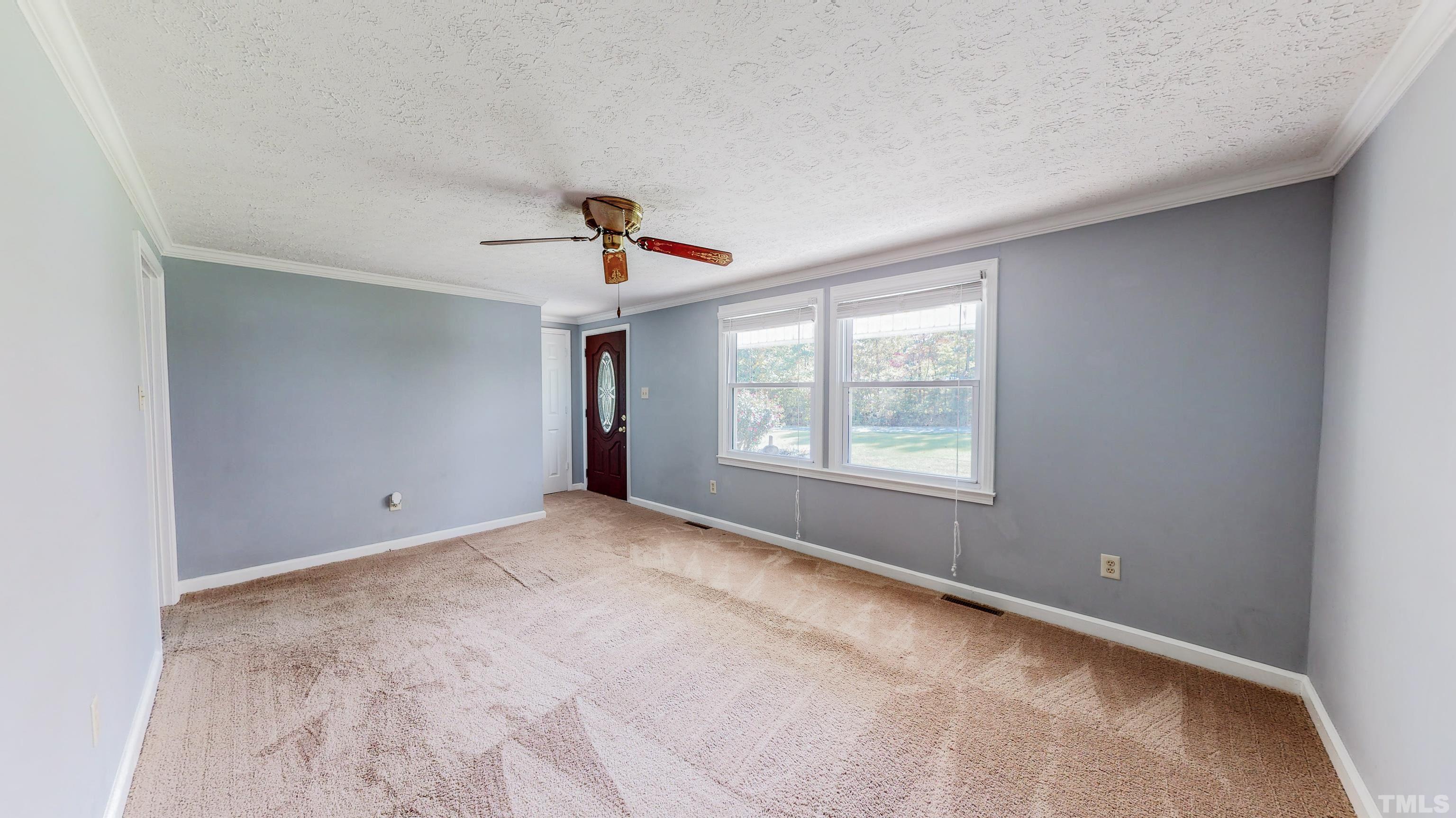180 Dancy Day Road Roxboro, NC 27574 - Photo 16 of 30 a view of an empty room with a window