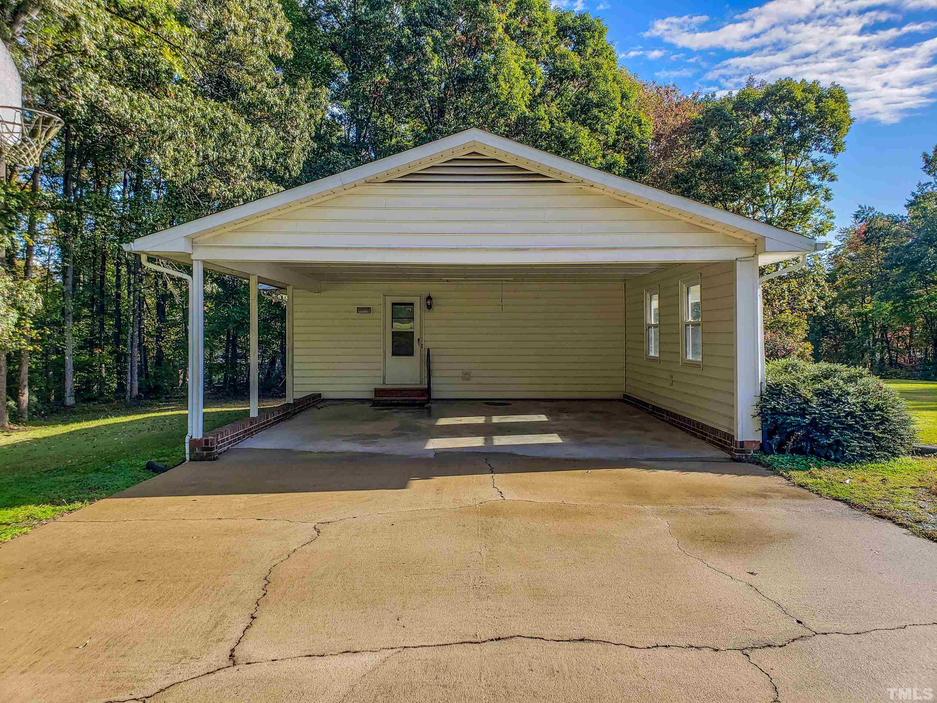 180 Dancy Day Road Roxboro, NC 27574 - Photo 19 of 30 a view of a house with a yard