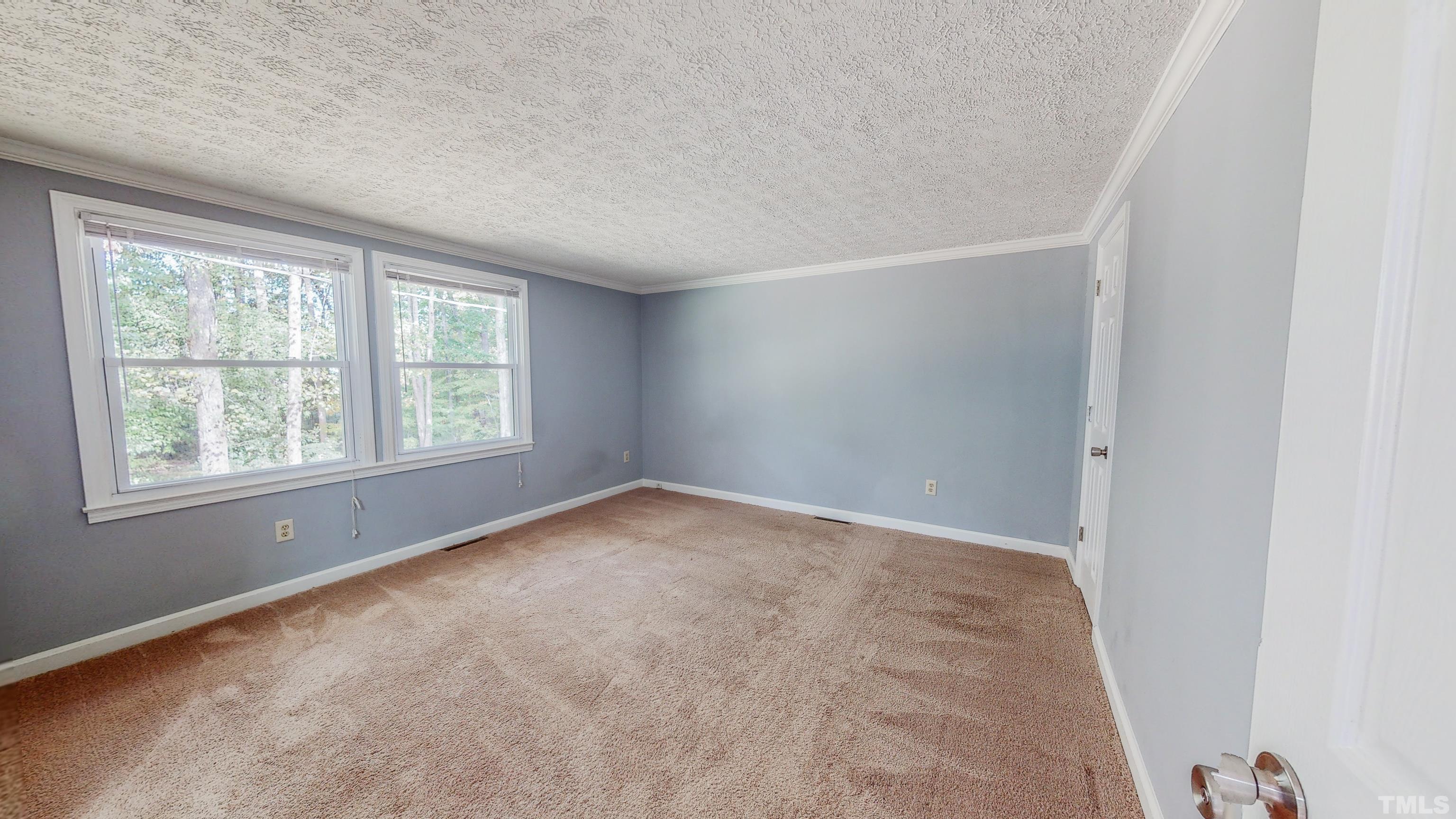 180 Dancy Day Road Roxboro, NC 27574 - Photo 20 of 30 an empty room with a window