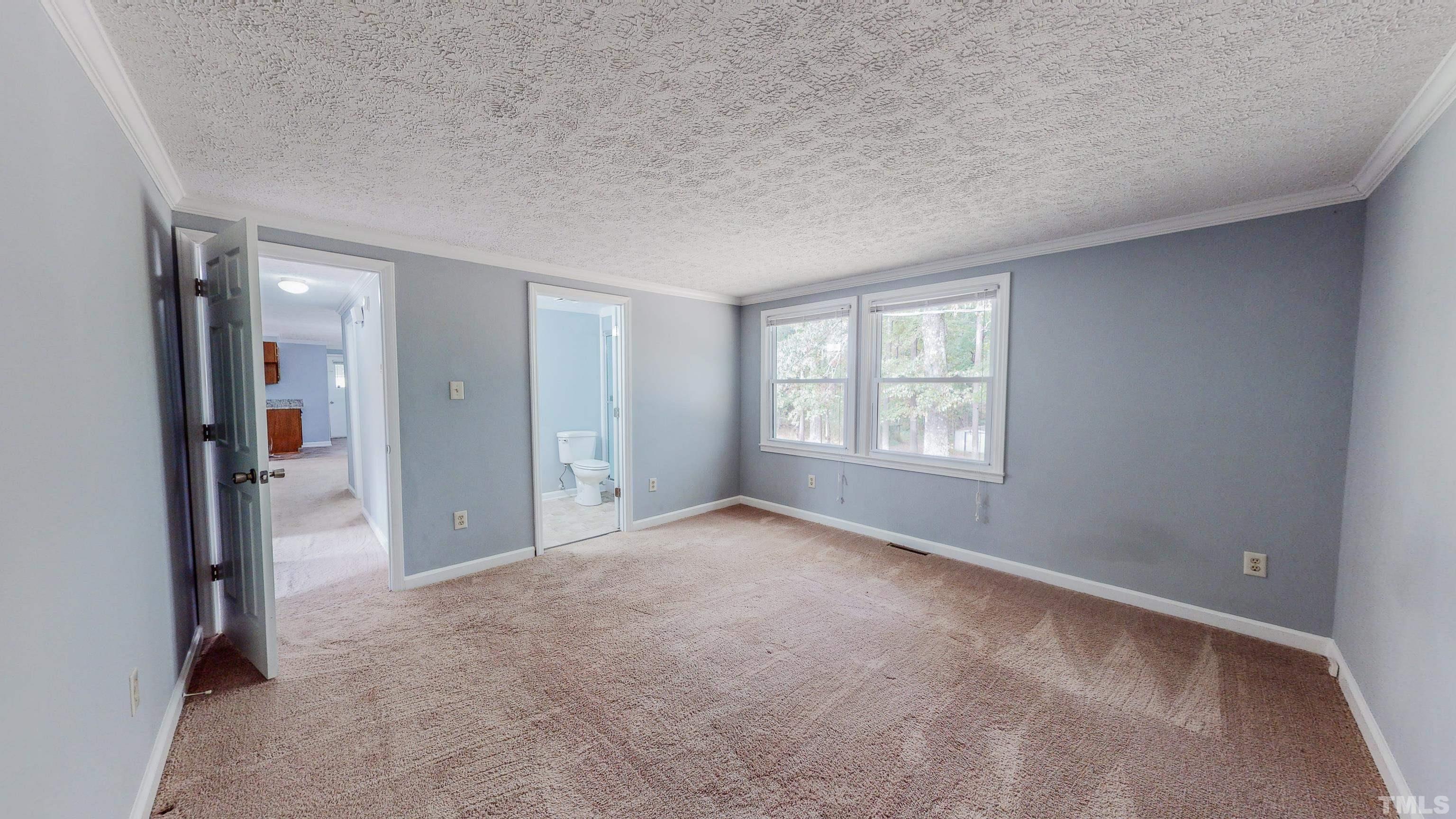 180 Dancy Day Road Roxboro, NC 27574 - Photo 21 of 30 a view of an empty room with a window