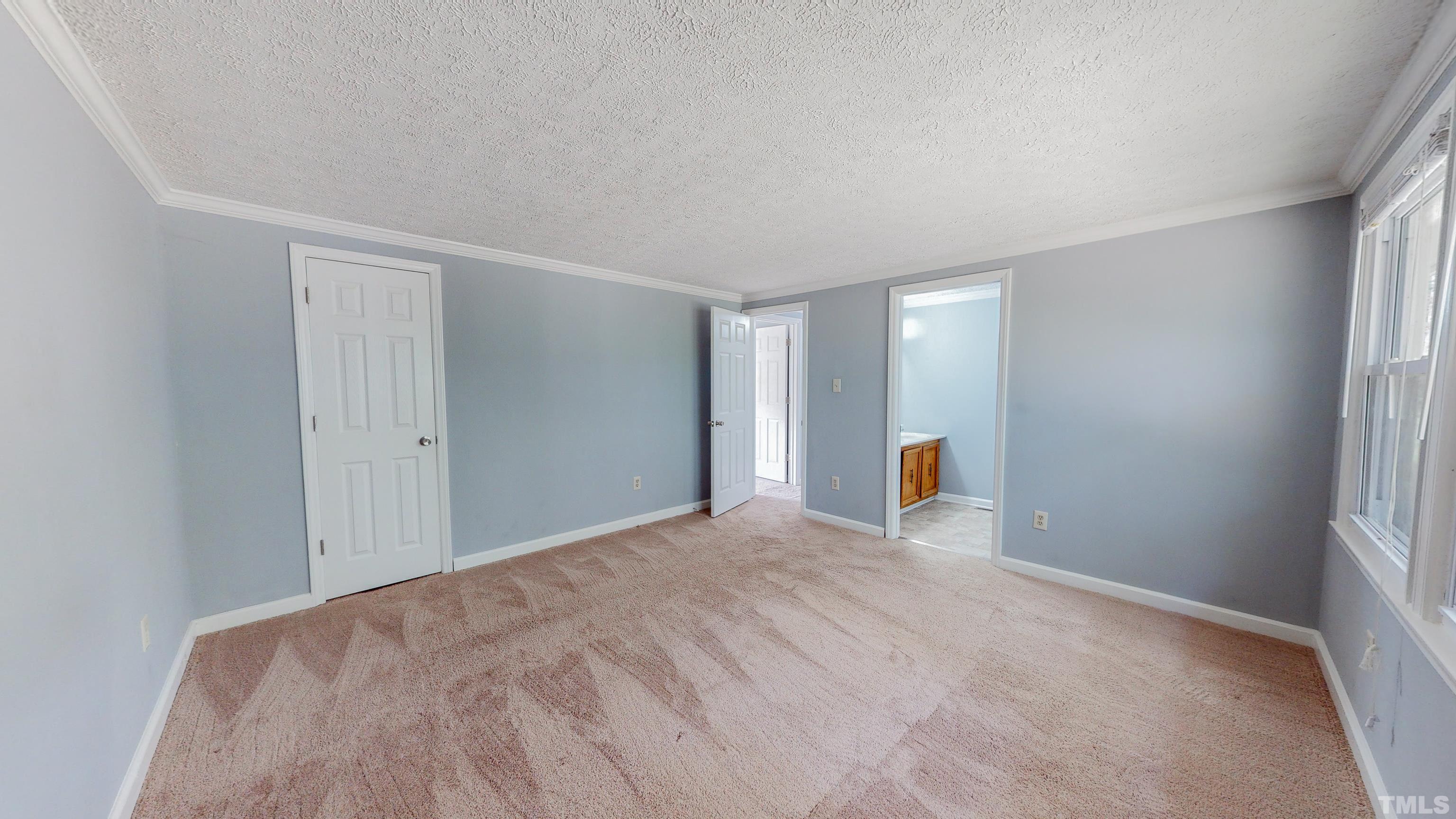 180 Dancy Day Road Roxboro, NC 27574 - Photo 22 of 30 a view of empty room with wooden floor