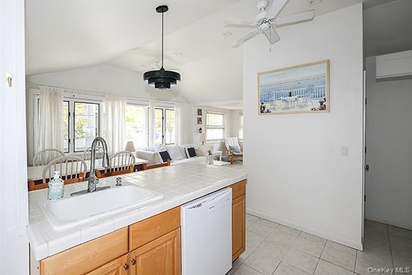 14 Lincoln Road Hampton Bays, NY 11946 - Photo 15 of 34 a bathroom with a sink and a mirror