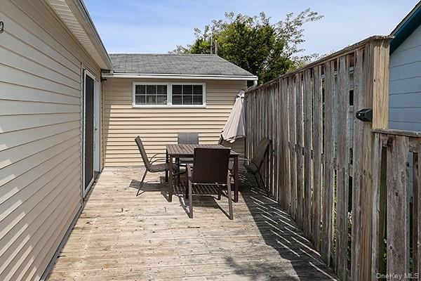 14 Lincoln Road Hampton Bays, NY 11946 - Photo 32 of 34 a house view with a seating space