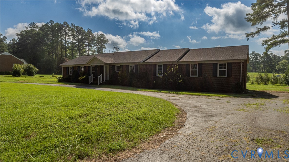 309 Old Plank Road Kenbridge, VA 23944 - Photo 3 of 45 Brick exterior residence with a covered front entr