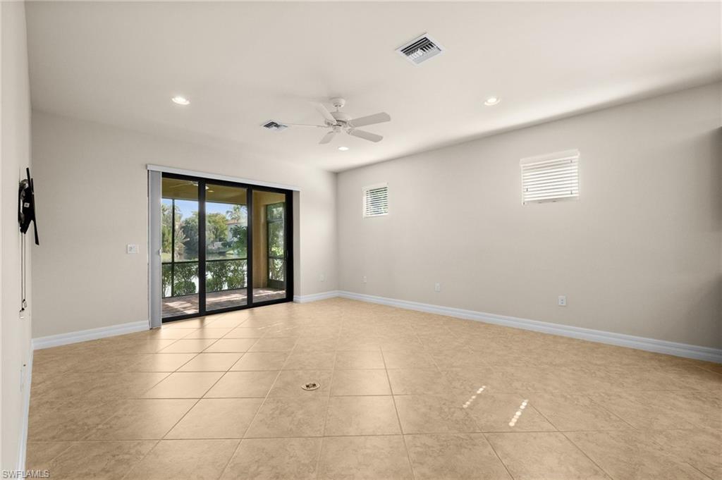 14650 Laguna Drive Fort Myers, FL 33908 - Photo 18 of 50 a view of an empty room with a window