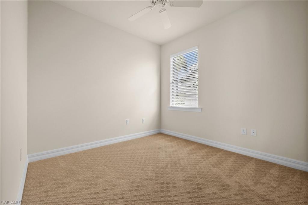 14650 Laguna Drive Fort Myers, FL 33908 - Photo 23 of 50 an empty room with windows