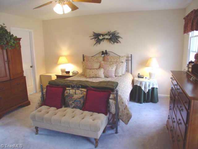 5509 Stonebridge Road Pleasant Garden, NC 27313 - Photo 3 of 9 Other. Master bedroom on main level with walk-in closet and master bathroom with jetted tub, seperate shower and double vanities.
