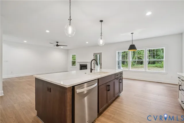 a kitchen with a sink and window